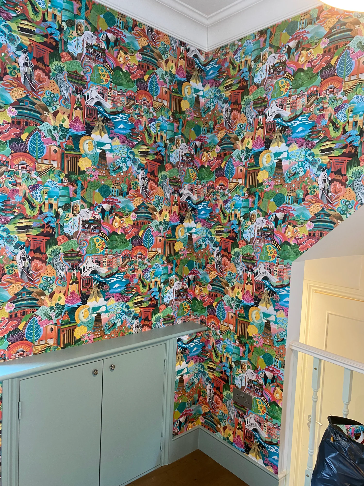 Corner detail showing perfect pattern alignment on maximalist wallpaper