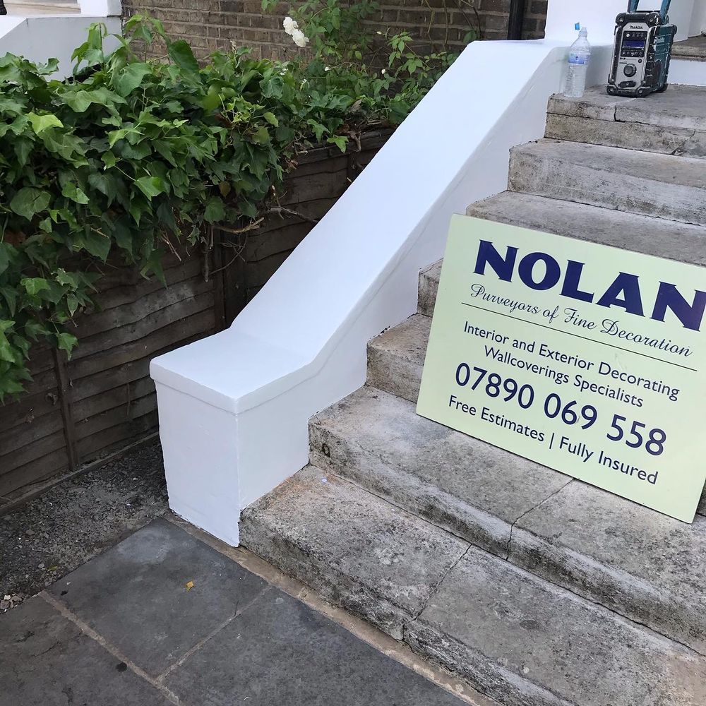 Exterior wall after painting by Nolan - pristine white finish