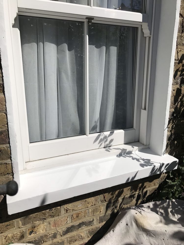 Window frame after painting by Nolan - crisp white finish