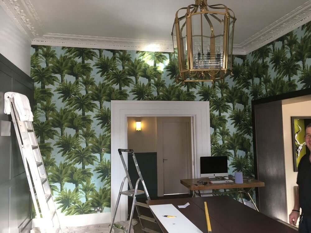 Tropical palm tree wallpaper installed by Nolan decorators in Essex home office
