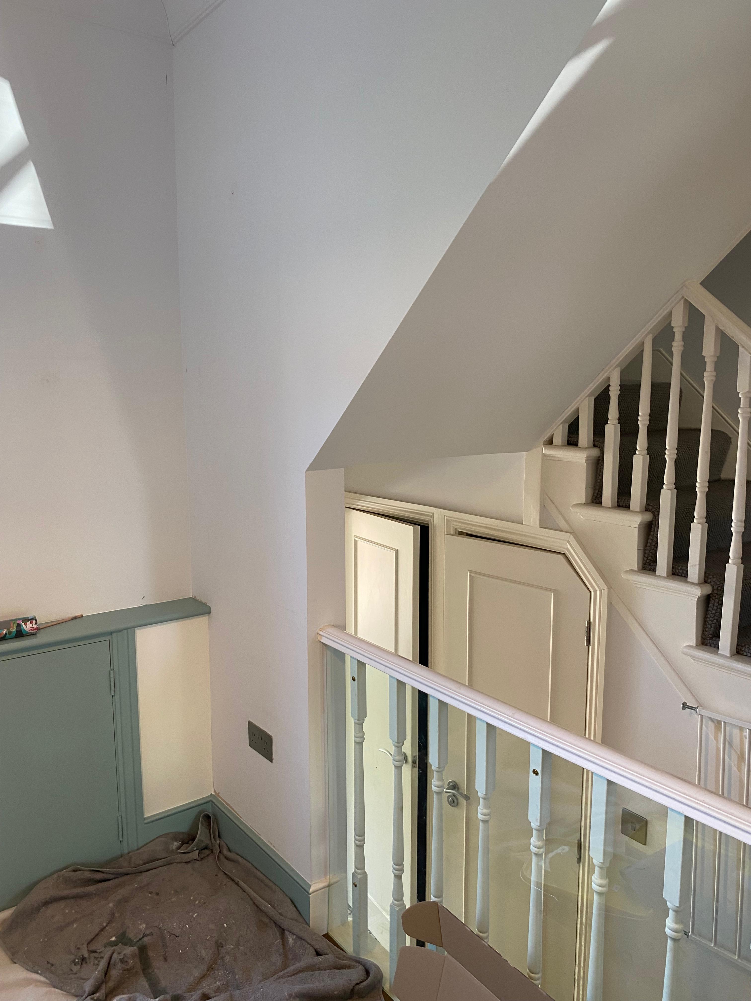 Hallway before maximalist wallpaper
